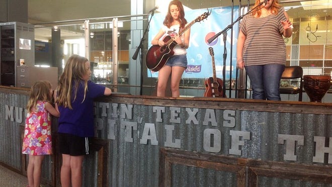 Austin-Bergstrom International Airport featured performances by a group of Austin-area musicians, all under the age of 18 during Kid Band Week, July 22-26. Round Rock fraternal twins Annie and Kate Brogdon performed July 23.
