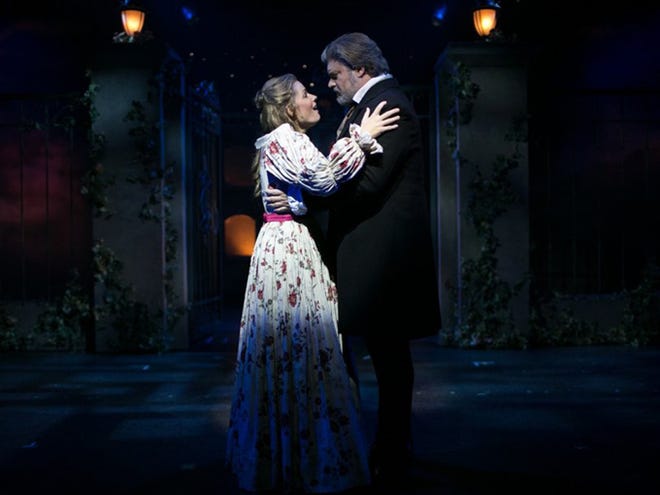 Carolann M. Sanita (as Cosette) and Rob Evan (as Jean Valjean) in the Flat Rock Playhouse production of "Les Miserables."