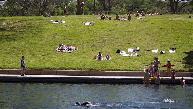 Barton Springs is one of Austin’s most beloved spots, perfect for sunbathing or swimming on a hot summer day.