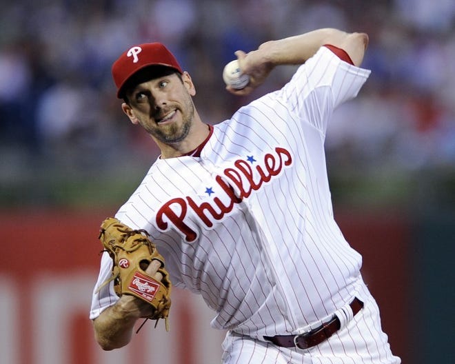 The Phillies' Cliff Lee suffered the loss against the Braves on Sunday in Philadelphia.