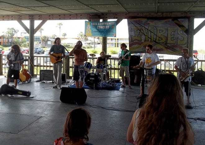 The St. Augustine band I-Vibes performs Sunday afternoon at the St. Augustine Beach Pier Pavilion as part of the 2nd Annual Arc in the Park concert. The event was sponsored by The Arc of the St. Johns Community Outreach Program, an organization made up of individuals with intellectual and developmental disabilities (IDD) who have "recognized a need to build friendships and give back and build a stronger community," said Arc Community Integration coordinator Laura Zbinden. Photos by Douglas Jordan