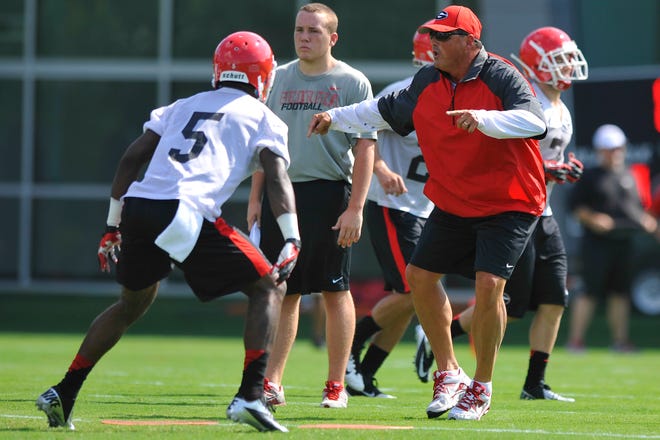 UGA defensive coordinator Todd Grantham works with the defense during practice on Aug. 1.