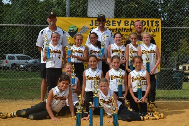 The Jersey Bandits 10U softball team won the Lacey Summer Storm tournament with a 6-0 record. Team members are (front, from left) Sofia Peterson and Carly Jones, (middle) Brianna Fischer, Allie Rome, Angelina Marino, Emily Spencer, (back) coach Bryan Jutting, Emma Chiemiego, Olivia Bisceglie, Gianna Schiera, coach Steve Chiemiego, Hailey Cope, Emily Reinstein, coach Bob Spencer and Dakota Jutting. Absent is coach Nick Schiera.