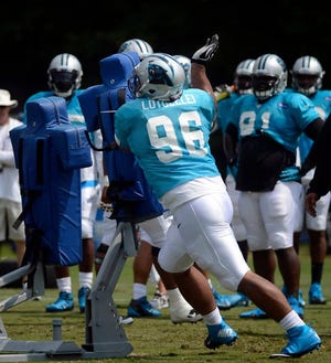 First-round draft pick Star Lotulelei works on a drill during training camp in Spartanburg, S.C. on Tuesday.