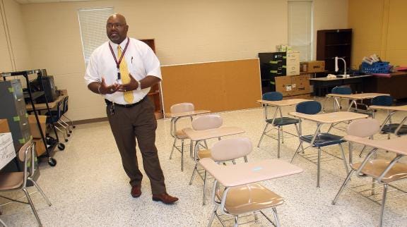 Principal Rodney Borders explains how the new Turning Point Academy has more than 30 classrooms to serve students beginning in August.