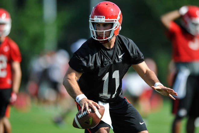 Aaron Murray on the field during the first day of the University of Georgia football practice in Athens, Ga., August 1, 2013. (AJ Reynolds/Staff, @ajreynoldsphoto)