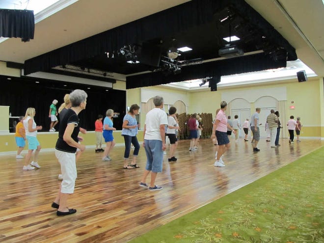 Jessicah Peters/The Sun Today The Line Dance group in Sun City meets every Sunday from 5-8 p.m. at Pinckney Hall.