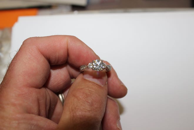 Police said they recovered this $10,000 diamond ring, which been stolen from an Easton home, in a Quincy pawn shop, Easton Police Chief Allen Krajcik said on Wednesday, Aug. 7, 2013. Francis X. Miller, 25, of 70 Plain St., Pembroke, will be charged with larceny over $250, Krajcik said. He will be summonsed to court at a later date.
