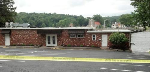 Photo by Jessica Masulli Reyes/New Jersey Herald - The River Styx Grill is seen with caution tape on Wednesday, August 7, 2013.