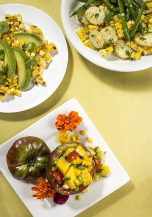 Salads give you new ways to use summer's bounty of sweet corn. Clockwise from top left, grilled corn, avocado and cilantro, corn, string beans and potato succotash, and tomatoes stuffed with fresh corn and mango salad.