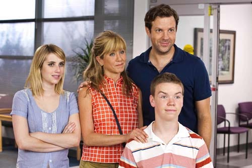 “We’re the Millers” stars, from left, Emma Roberts, Jennifer Aniston, Jason Sudeikis, background right, and Will Poulter.
