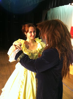 Belle (Logan Aughtry) and the Beast ( Kaleb Caldwell) enjoy a dance in “Disney’s Beauty and the Beast, Jr.”