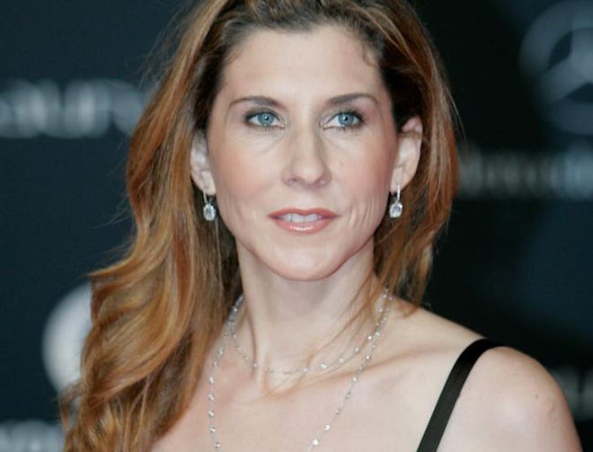 In this Feb. 7, 2011, file photo, Monica Seles arrives for the Laureus Awards in Abu Dhabi, United Arab Emirates.