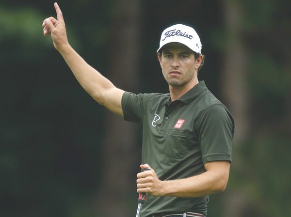 Adam Scott celebrates a birdie on the second hole during the second round of the PGA Championship on Friday. (Charlie Neibergall | Associated Press)