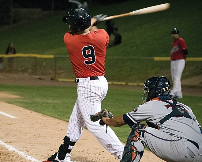 The Mavericks' Kevin Rivers swings during Friday night's win against the JetHawks at Stater Bros. Stadium.