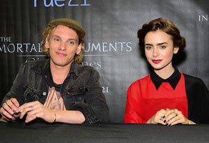 Jamie Campbell Bower and Lily Collins | Photo Credits: Lisa Lake/Getty Images