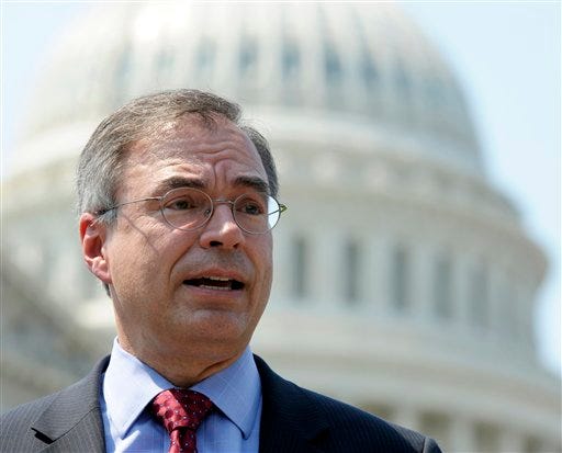 FILE - In this June 28, 2012 file photo Rep. Andy Harris, R-Md., speaks at a news conference outside the US Capitol in Washington. As immigration advocates swarm the country trying to persuade House Republicans to pass a comprehensive immigration overhaul, Harris held a town hall meeting this August northeast of Baltimore, Md., with an overflow crowd who booed loudly when an audience member asked him to support a path to citizenship for immigrants in the U.S. illegally. Harris shot the idea down calling it a "nonstarter" that's "not going anywhere fast" in the House. (AP Photo/Cliff Owen)