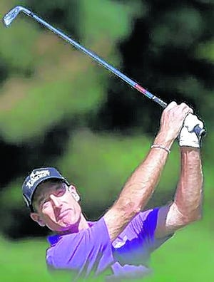 Jim Furyk hits from the third fairway Saturday at the PGA Championship.
ASSOCIATED PRESS / JULIO CORTEZ