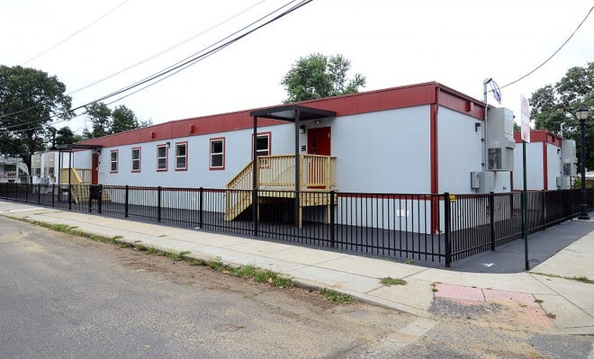 Exterior of modular units located behind the Riverside School District schools at the corner of Grant Street and Paine Street.