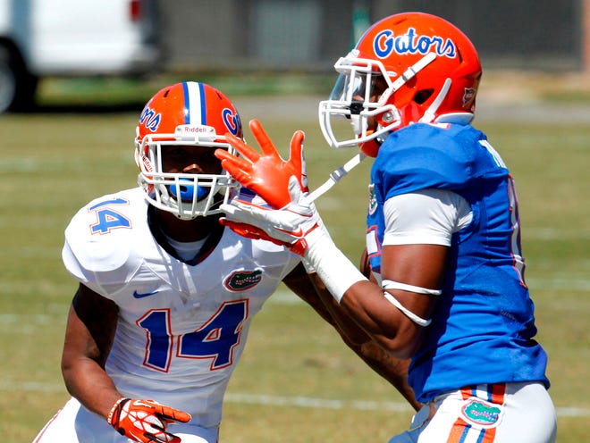 Cornerback Loucheiz Purifoy, right, will get more reps at receiver later this week.