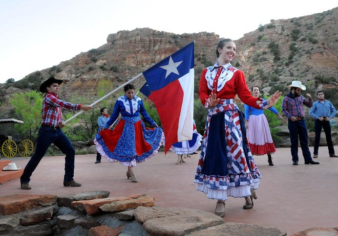 In this May 21, 2013 photo, "Texas" cast members rehearse on stage at the Pioneer Amphitheatre in Palo Duro Canyon, Texas. Five cast members of the musical were killed in an automobile accident Monday night, Aug. 12, 2013 near Dumas, Texas, said Christopher Ray, a Texas Department of Public Safety spokesman. (AP Photo/Amarillo Globe-News, Sean Steffen)