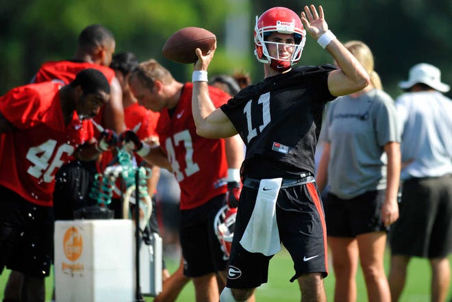 Georgia quarterback Aaron Murray throws a pass during the first day of fall football practice at the University of Georgia in Athens, Ga., Thursday, Aug. 1, 2013. (AJ Reynolds/Staff, @ajreynoldsphoto)