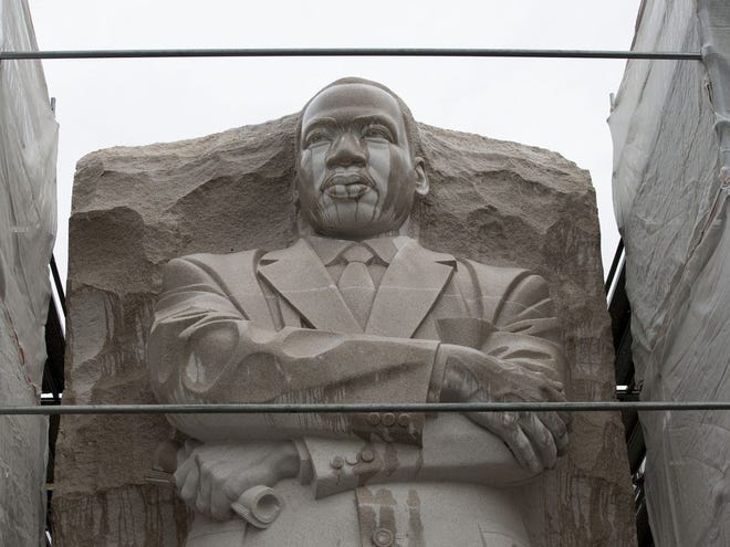 Scaffolding surrounds the Martin Luther King Jr. Memorial in Washington, D.C., Tuesday after a disputed inscription was removed. (The Associated Press)