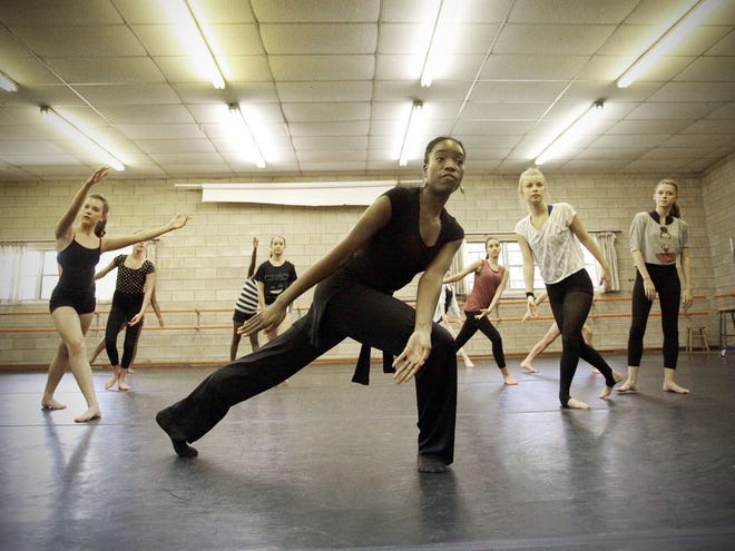 Omoniyi Osoba, a master teacher, dancer and performer, instructs the advanced dance group at Pofahl Studios.