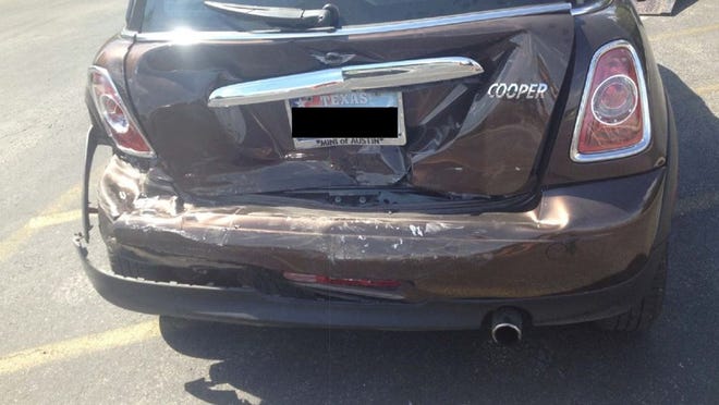 A photo provided by the Meyerson Law Firm shows the car that they say Travis County Assistant District Attorney Brandon Grunewald rear-ended. The license plate in the photo was redacted by the law firm.