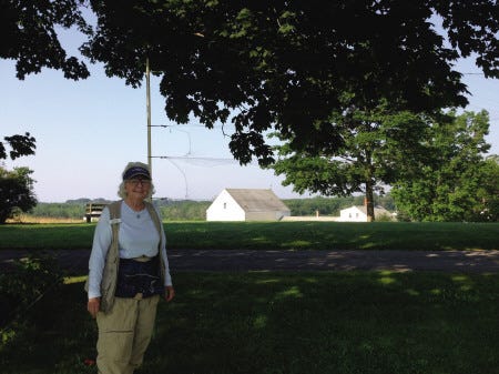 June Ficker, who can be found just about every Wednesday morning in the shade of a large beech tree at Wells Reserve’s Laudholm Farm, uses six mist nets to capture birds to study and then release.