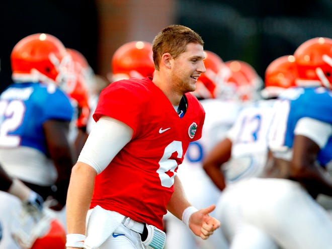 Jeff Driskel takes the field with his teammates at practice on Thursday.