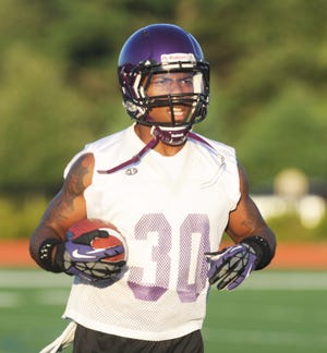 Jamal Johnson of Brockton runs through a drill during Stonehill College football practice on Thursday, Aug. 15, 2013.

 


 



 


 



--