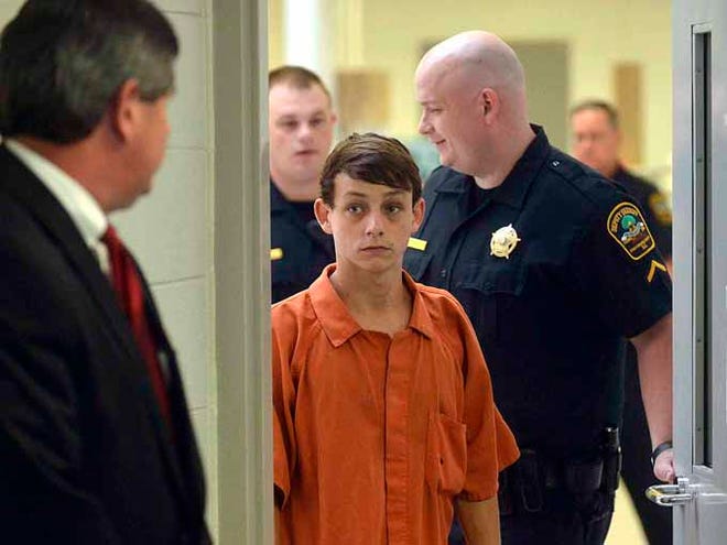 Daniel Woosley walks into the court room during a bond hearing held Friday at the Spartanburg County Detention Facility.