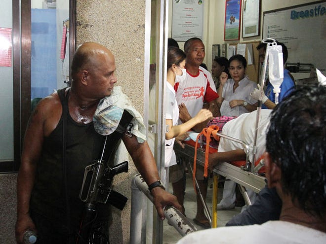 Survivors area at a hospital late Friday in Cebu, central Philippines. Passenger ferry MV Thomas Aquinas with nearly 700 people aboard sank near the central Philippine port of Cebu on Friday night after colliding with a cargo vessel, and a survivor said he saw bodies in the sea.