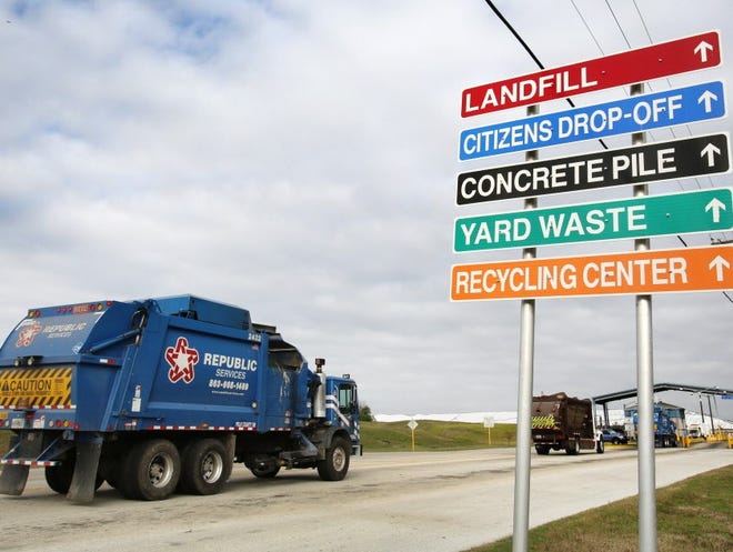 A Republic garbage truck enters the scales at the entrance to the Polk County landfill in January.