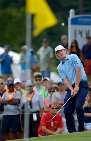 Brandt Snedeker watches his ball after hitting a pitch shot to the ninth hole during the first round of the Wyndham Championship on Thursday.