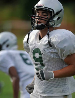 Athens Academy's Michael Santamaria runs a few drills during a practice at Athens Academy on Tuesday, Aug. 13, 2013.  (Richard Hamm/Staff) OnlineAthens / Athens Banner-Herald