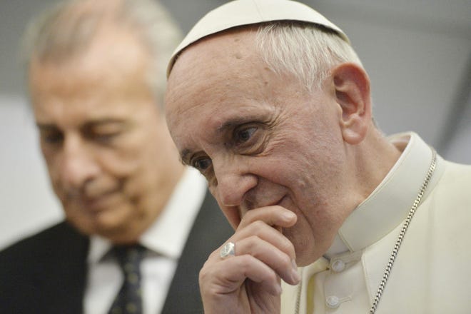 Pope Francis speaks about gays and the church July 29 on a flight from Brazil.