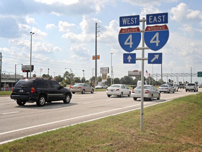 Cars travel north on U.S. 27 at the intersection of Interstate 4 near Davenport. Florida's highways recently were ranked as the third-busiest in the country.