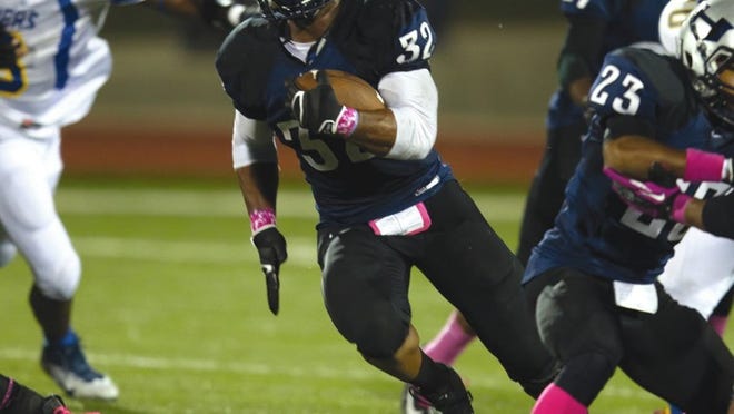 Hendrickson running back Samaje Perine looks for yardage during a game against Pflugerville last season. Perine, an Oklahoma recruit, has rushed for more than 3,500 yards in his first two varsity seasons.