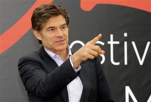 FILE - This June 13, 2012 file photo shows television personality Dr. Mehmet Oz during a photocall at the 2012 Monte Carlo Television Festival in Monaco. On Tuesday, Aug. 20, 2013, Oz rushed to an accident scene after a yellow cab jumped the curb and struck a pedestrian outside New York's Rockefeller Center. Oz says in a statement that emergency medical crews were already treating the injured woman who had a bad leg wound. He says a good Samaritan made a tourniquet out of a belt for the woman. (AP Photo/Lionel Cironneau, File)
