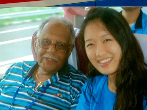 Fred Johnson Sr. rides a tour bus to the demilitarized zone between the two Koreas with a young woman. He said the 22-year-old college student had spent time in the United States, but this was her first trip to the DMZ. Contributed photo