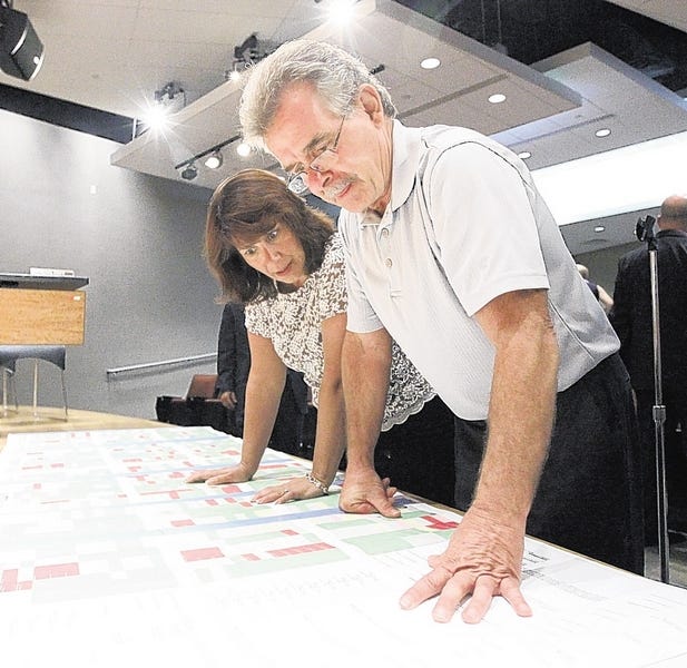Orange County legislators Roseanne Sullivan and Michael Paduch review the Greenway Compact after a public hearing Monday evening at the Emergency Services Center in Goshen.