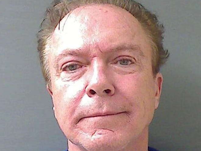 This Wednesday, Aug. 21, 2013 booking mug released by the Schodack (NY) Police Department shows actor-singer David Cassidy. Cassidy, best known for his role as Keith Partridge on "The Partridge Family," is free on $2,500 bail after being charged with felony driving while intoxicated in upstate New York. Schodack Police Lt. Joseph Belardo says Cassidy was stopped early Wednesday for failing to dim his headlights about 10 miles south of Albany. Belardo says Cassidy was charged with DWI after tests showed his blood-alcohol content at .10, higher than the stateâ€™s legal limit of .08. (AP Photo/Schodack Police Department)
