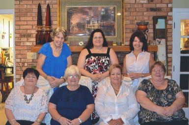 Top, from left, Karen Fitzgerald, bride Jessica Wintz and Suzan Bezet. Seated, Sissy Irwin, Lofty Bezet, Georgia Himel and Alicia Himel. Not pictured, Robin Joiner, Barbara Gerace, Patricia Hergruder and Karen Patrick.