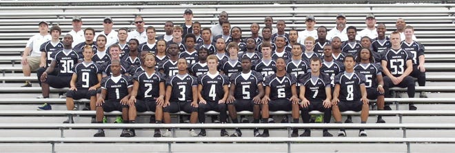 The 2013 Havelock Rams pose for a team picture before practice last week. Havelock opens 2013 Friday at Washington.