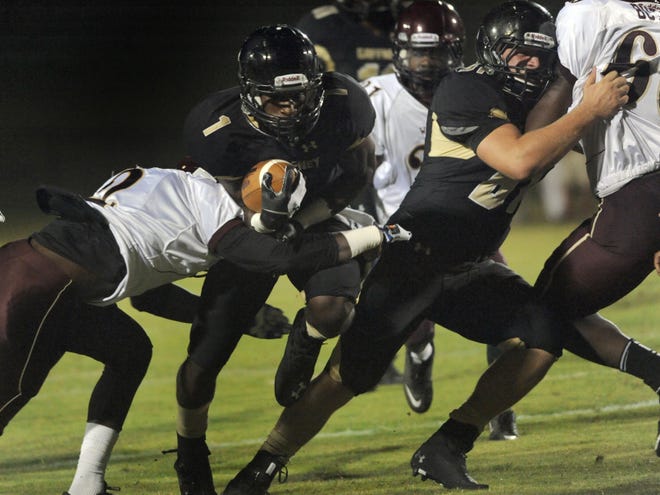 Running back Hyleck Foster (1) and Gaffney travel to Northwestern tonight in a clash of top-three teams.