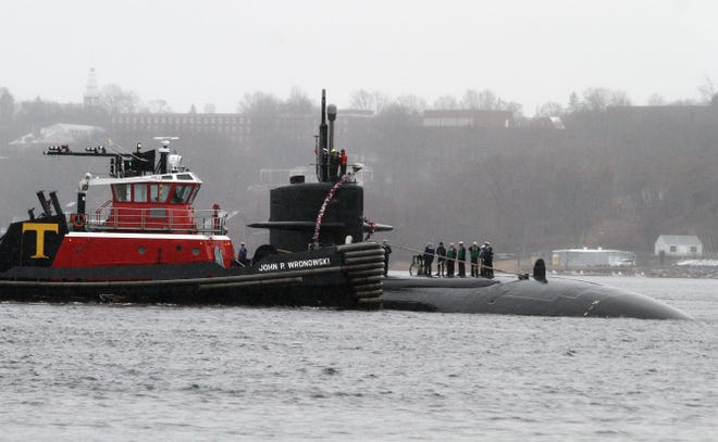 The Los Angeles-class attack submarine Providence returns to Naval Submarine Base New London on March 19 following its lengthy deployment. Command was turned over to Cmdr. Tony S. Grayson on Thursday.