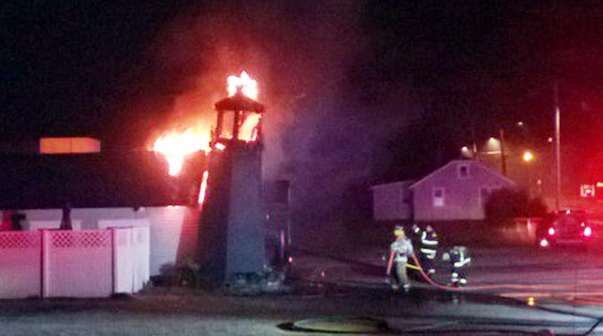 The lighthouse at the corner of the Stone Soup at 141 High St. was ablaze at about 4 a.m. Aug. 23. Next-door neighbor Lisa Gianakakis-Testaverde caught this dramatic image.