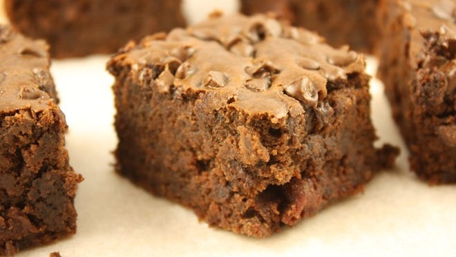 With the help of sugar, cocoa and vanilla, these gluten-free fudgy black bean brownies taste almost like regular brownies, just a little more dense than those made without beans.
